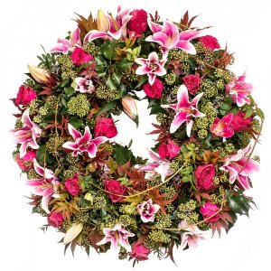 Stargazer lilies funeral wreath